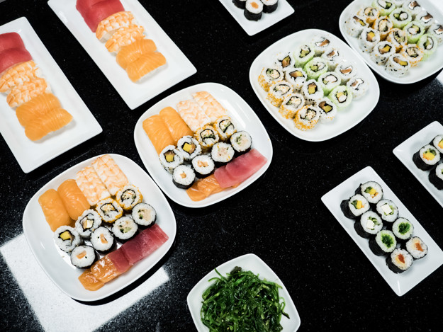 Different types of sushi at a table